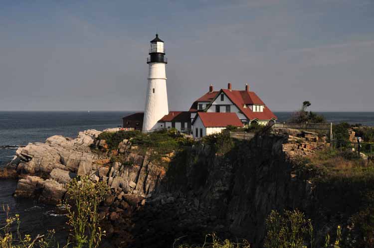 Portland Head Light is the iconic lighthouse of Cape Elizabeth. It sits on the dramatic shores of Fort Williams Park. It was first lit in January of 1790. A plaque on the grounds of the light reads that Henry Wadsworth Longfellow often visited this lighthouse and that it was the inspiration for his poem "The Lighthouse."